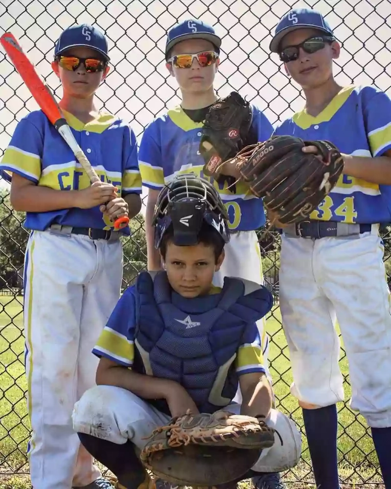 Players wearing  Wooter  Custom Lightweight 2-Button Baseball Jerseys