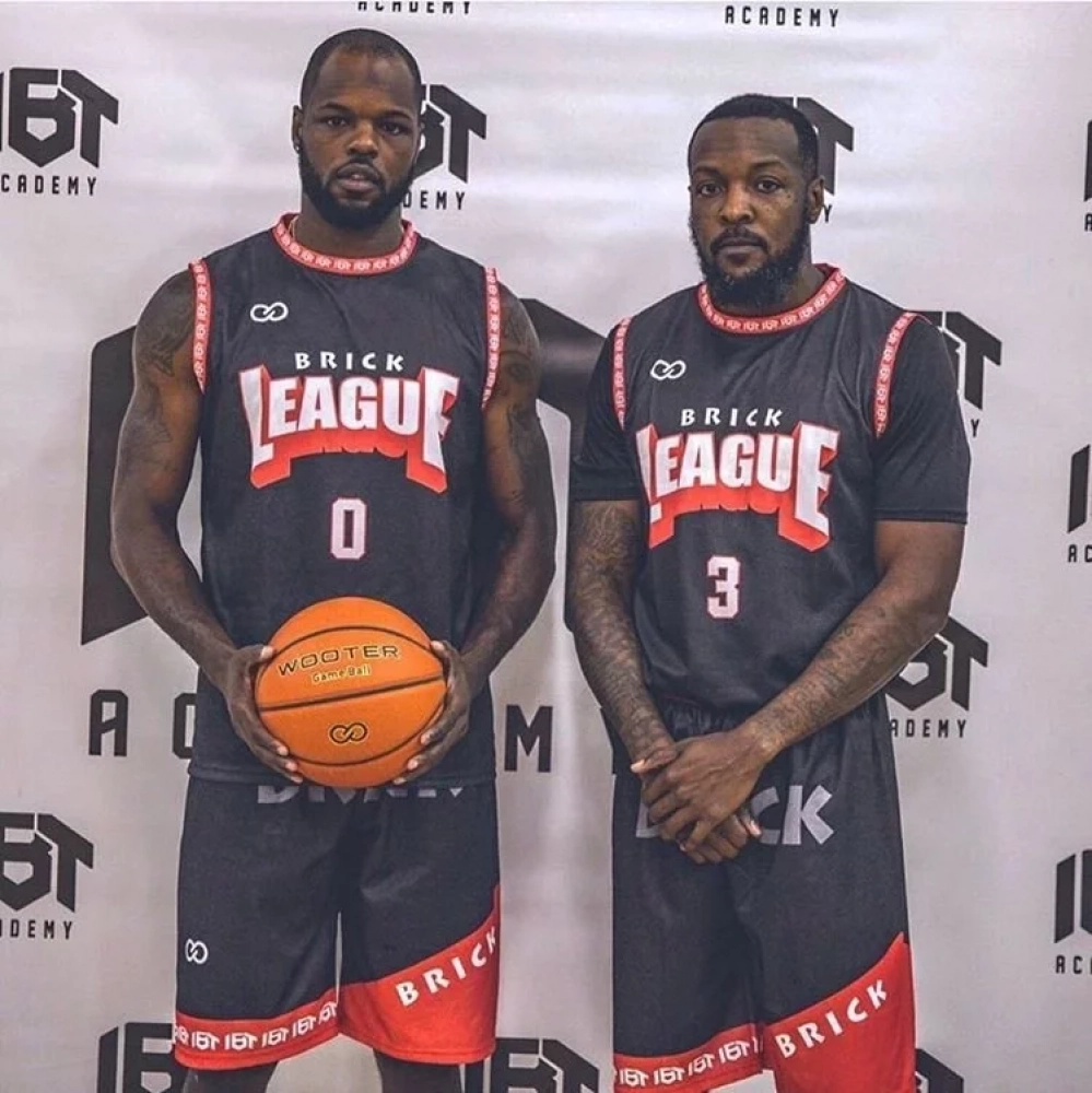 Player Holding Wooter Custom Game Basketballs