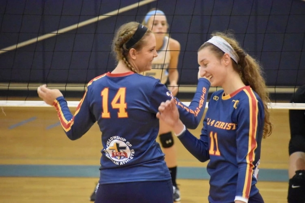 Team All 4 Christ Wearing Wooter Custom Long Sleeve V-Neck Volleyball Jerseys in blue design