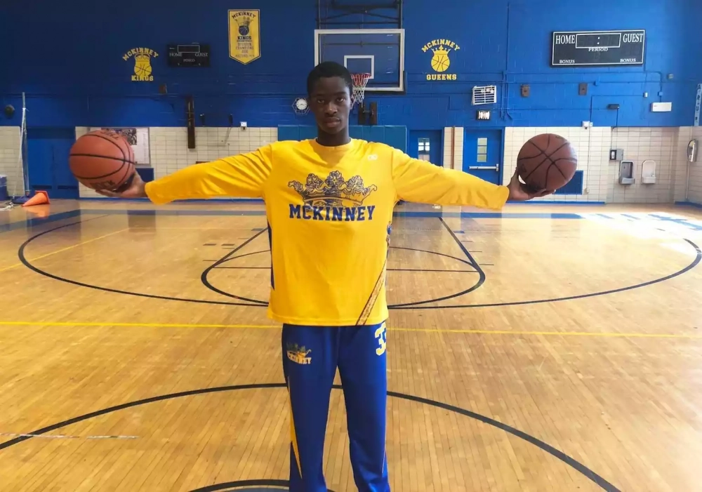 Player wearing McKinney Yellow and blue Custom Long Sleeved Shooting Shirts