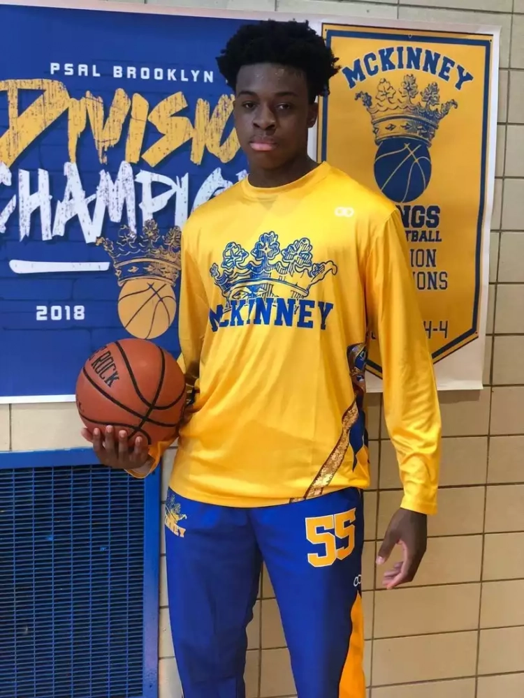 Player wearing McKinney Yellow and blue Custom Long Sleeved Shooting Shirts