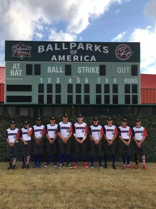 Team Warriors wearing Wooter Custom Lightweight Crew Neck Baseball Jerseys in black, red and white design
