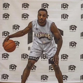 Player Holding Wooter Custom Game Basketballs