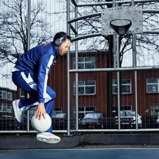 Player Wearing Wooter Custom Warmup Pants - blue and white design