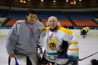 Sublimated ice hockey goalie jersey with laced neckline,