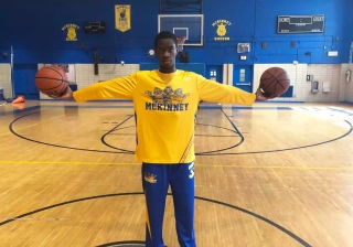 Player wearing McKinney Yellow and blue Custom Long Sleeved Shooting Shirts