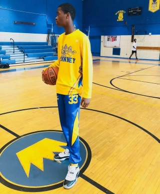 Player wearing McKinney Yellow and blue Custom Long Sleeved Shooting Shirts